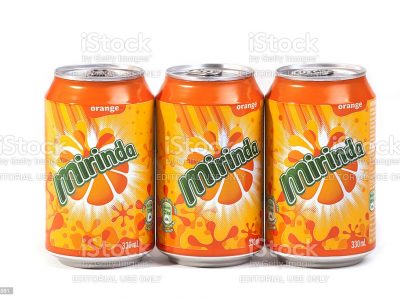 Cologne,Germany - August 29,2012: studio product shot of 3 cans of Mirinda(orange drink) isolated on white background.Mirinda made by Pepsico Inc. Mirinda is owned by PepsiCo since 1970 and is primarily commercialized outside North America.